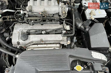 Хэтчбек Mazda 323 2003 в 
