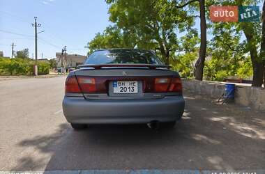 Седан Mazda 323 1996 в 