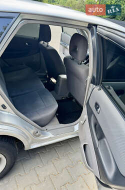 Хэтчбек Mazda 323 2002 в 