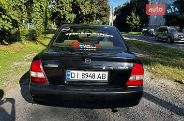 Седан Mazda 323 1999 в 