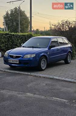 Хэтчбек Mazda 323 2003 в 