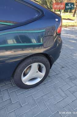 Хэтчбек Mazda 323 1996 в 