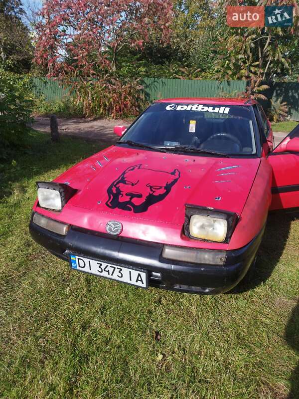 Хэтчбек Mazda 323 1994 в Нововолынске фото 2 Хэтчбек Mazda 323 1994 в Нововолынске