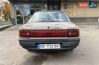 Седан Mazda 323 1996 в 