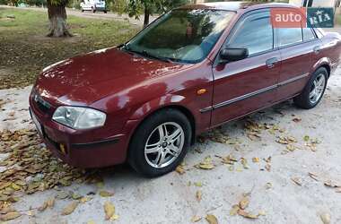 Седан Mazda 323 1999 в 
