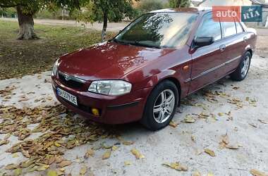 Седан Mazda 323 1999 в 