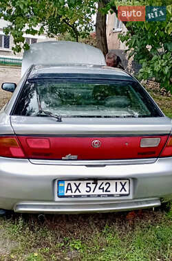 Хэтчбек Mazda 323 1996 в 