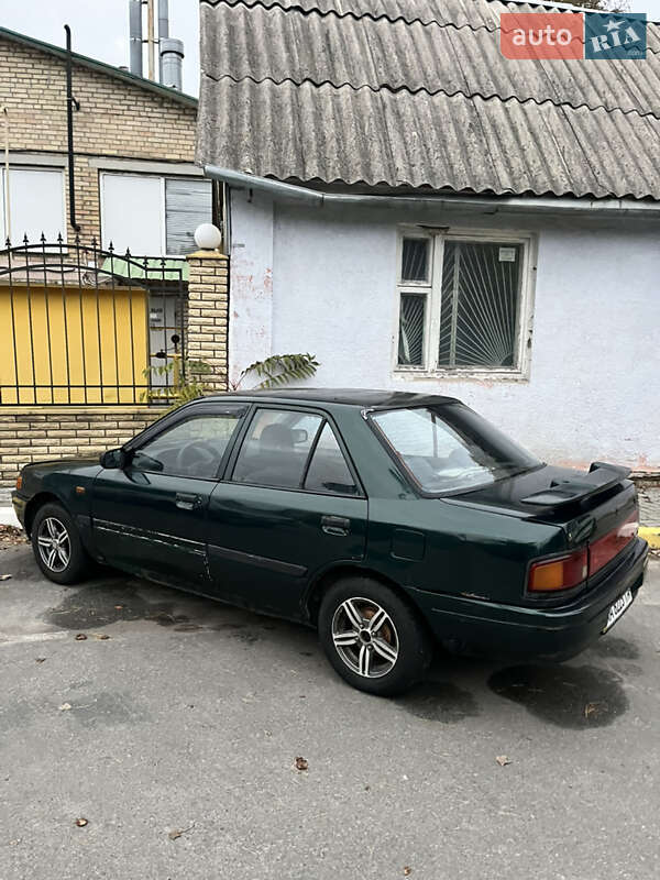 Седан Mazda 323 1994 в Ирпене фото 7 Седан Mazda 323 1994 в Ирпене