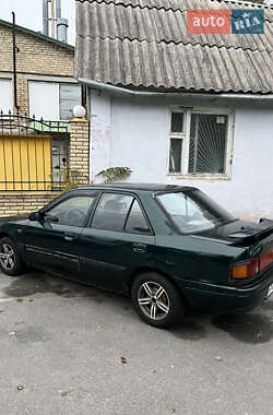 Седан Mazda 323 1994 в  фото 7 Седан Mazda 323 1994 в