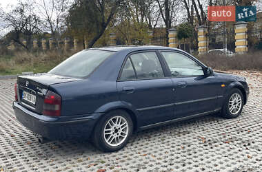 Седан Mazda 323 1999 в 