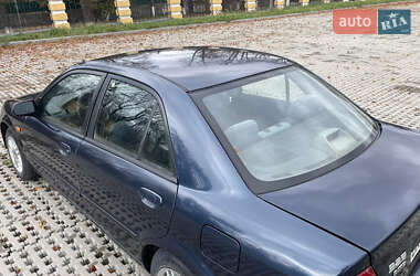 Седан Mazda 323 1999 в 