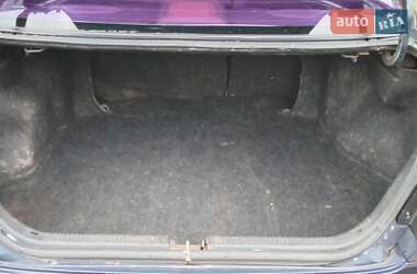 Седан Mazda 323 1998 в  фото 12 Седан Mazda 323 1998 в