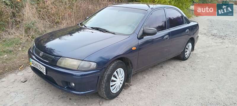 Седан Mazda 323 1998 в Дніпрі фото Седан Mazda 323 1998 в Дніпрі