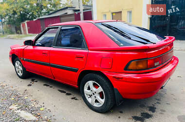 Хетчбек Mazda 323 1990 в  фото 4 Хетчбек Mazda 323 1990 в