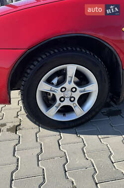Хэтчбек Mazda 323 1995 в  фото 10 Хэтчбек Mazda 323 1995 в