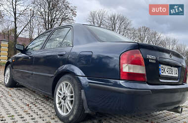 Седан Mazda 323 1999 в  фото 8 Седан Mazda 323 1999 в
