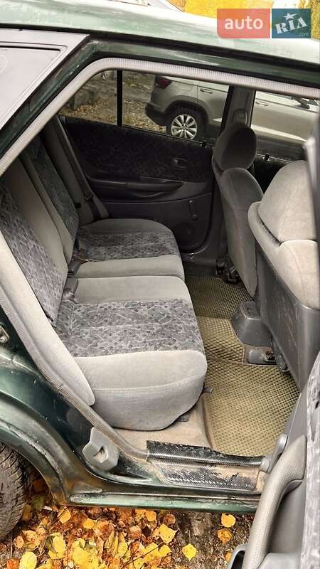 Хетчбек Mazda 323 1999 в Києві фото 6 Хетчбек Mazda 323 1999 в Києві