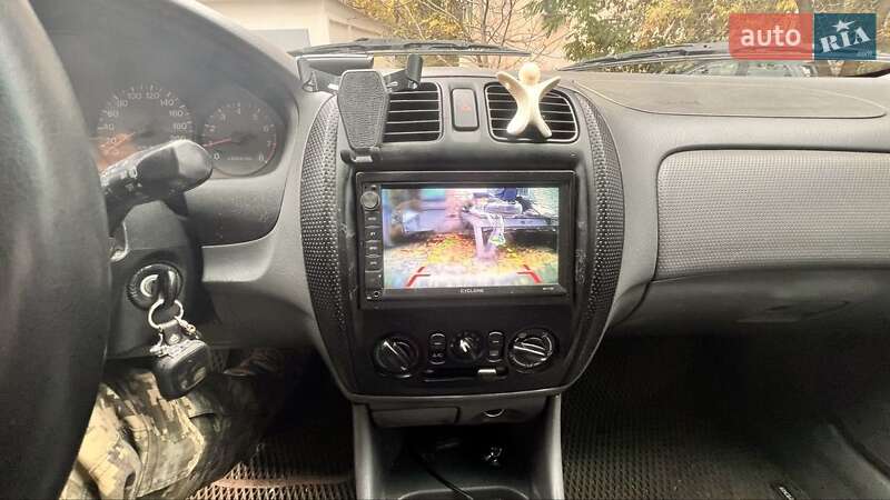 Хетчбек Mazda 323 1999 в Києві фото 16 Хетчбек Mazda 323 1999 в Києві