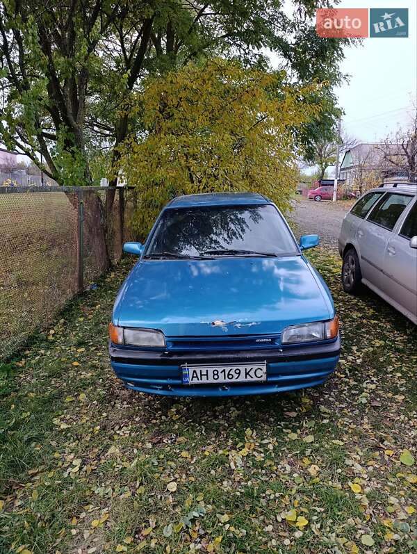 Седан Mazda 323 1995 в Сумах
