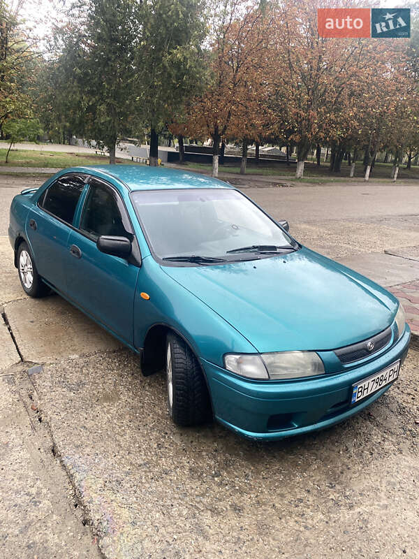 Седан Mazda 323 1998 в Одесі фото 26 Седан Mazda 323 1998 в Одесі