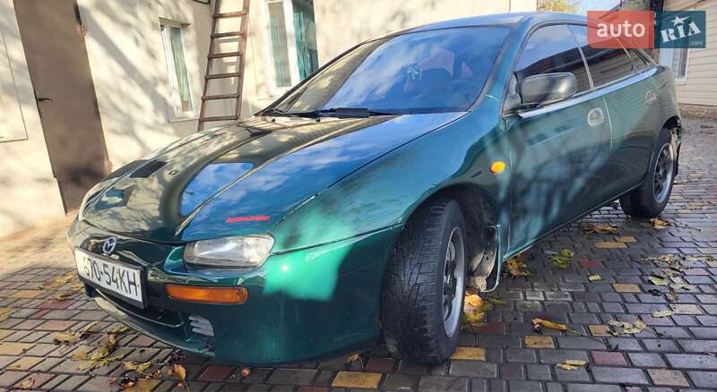 Хетчбек Mazda 323 1998 в Подільську фото Хетчбек Mazda 323 1998 в Подільську