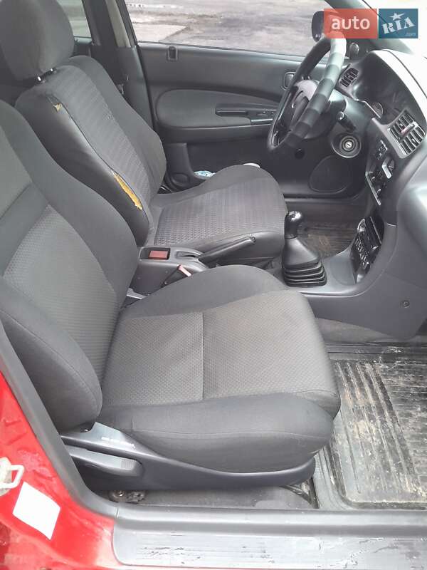 Седан Mazda 323 1996 в Синельниково фото 14 Седан Mazda 323 1996 в Синельниково