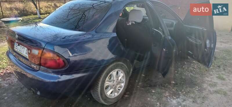Седан Mazda 323 1996 в Коломые фото 10 Седан Mazda 323 1996 в Коломые