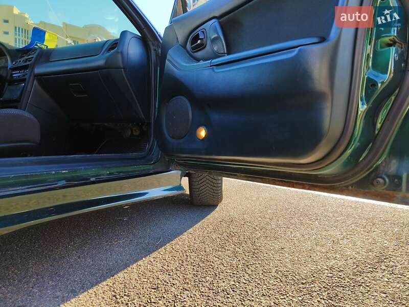 Хэтчбек Mazda 323 1994 в Николаеве фото 44 Хэтчбек Mazda 323 1994 в Николаеве