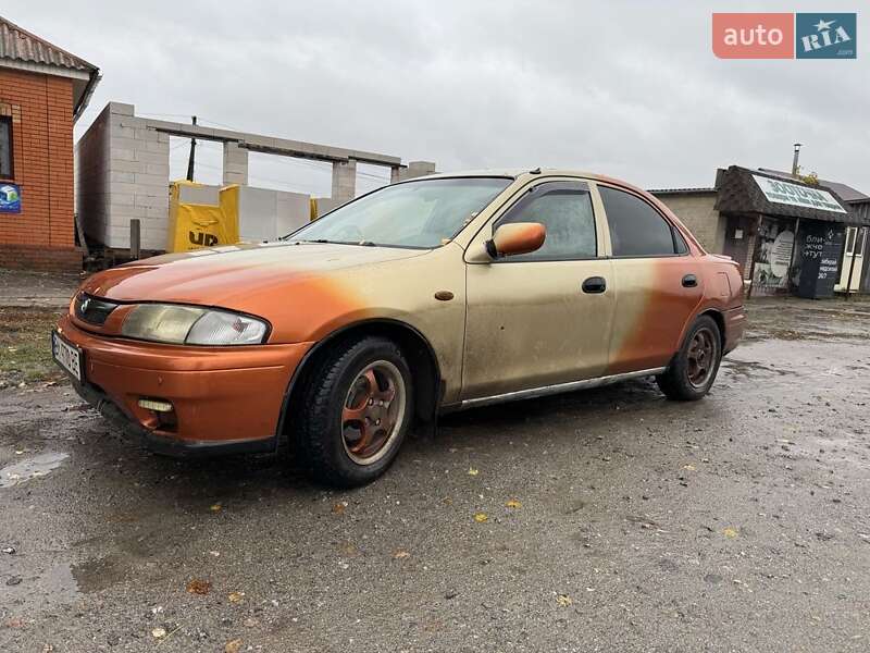 Седан Mazda 323 1997 в Сумах фото 2 Седан Mazda 323 1997 в Сумах