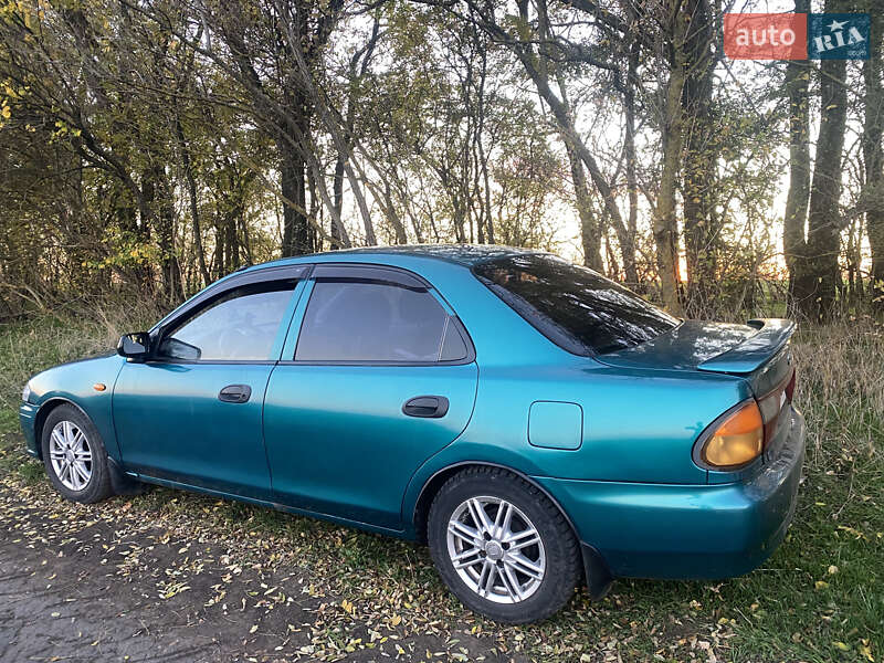 Седан Mazda 323 1998 в Одесі фото 30 Седан Mazda 323 1998 в Одесі