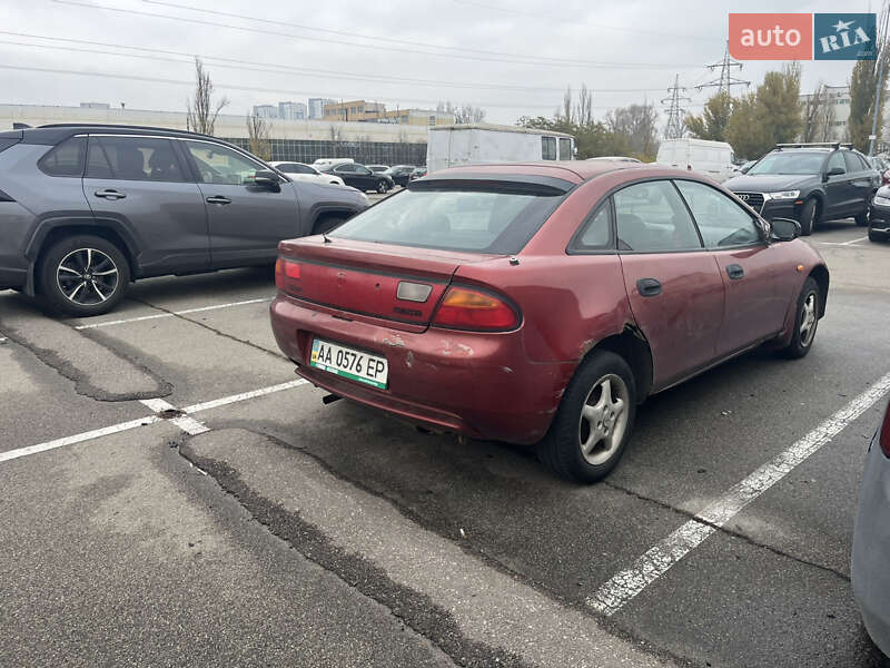 Хэтчбек Mazda 323 1994 в Вышгороде фото 9 Хэтчбек Mazda 323 1994 в Вышгороде
