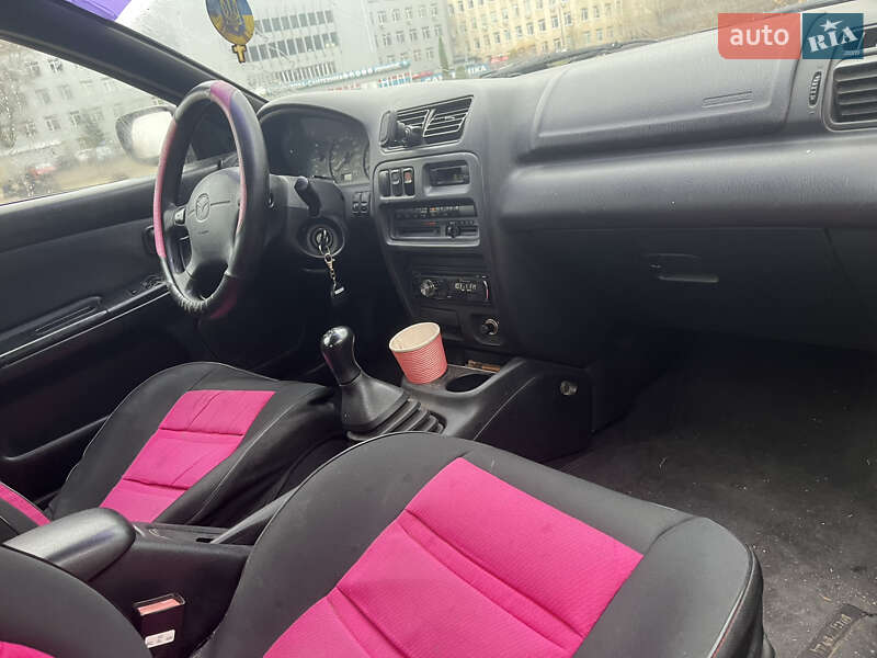 Хэтчбек Mazda 323 1994 в Вышгороде фото 15 Хэтчбек Mazda 323 1994 в Вышгороде