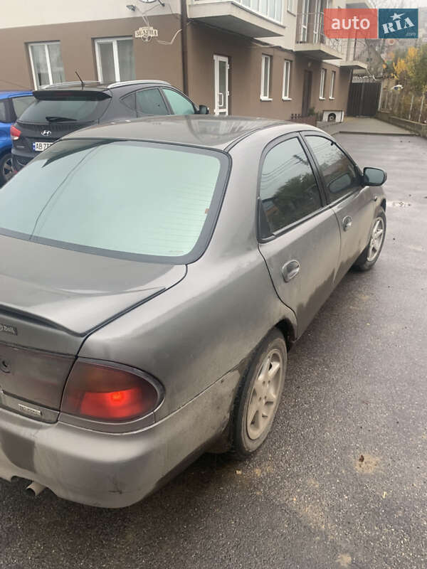 Седан Mazda 323 1998 в Виннице