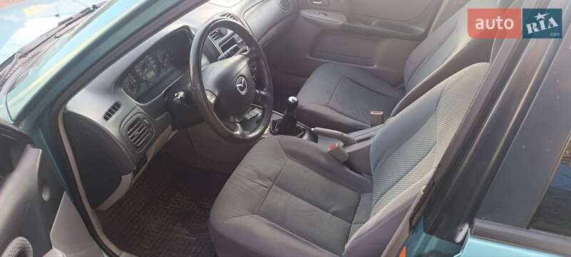Хетчбек Mazda 323 2002 в Рафалівці фото 6 Хетчбек Mazda 323 2002 в Рафалівці