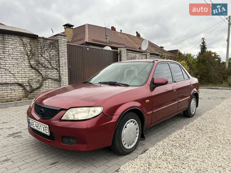 Седан Mazda 323 2002 в Дніпрі фото Седан Mazda 323 2002 в Дніпрі