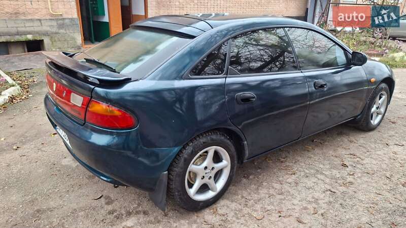 Седан Mazda 323 1996 в Хмельницком