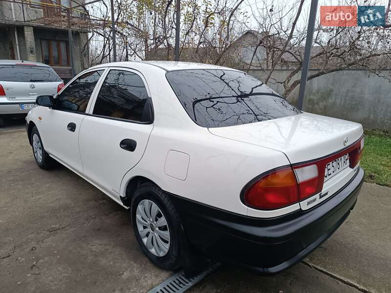 Седан Mazda 323 1998 в Чернівцях фото 42 Седан Mazda 323 1998 в Чернівцях