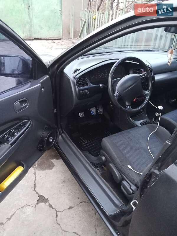 Седан Mazda 323 1995 в Одесі фото 2 Седан Mazda 323 1995 в Одесі