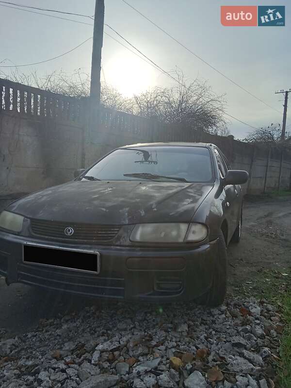 Седан Mazda 323 1995 в Одесі фото 9 Седан Mazda 323 1995 в Одесі