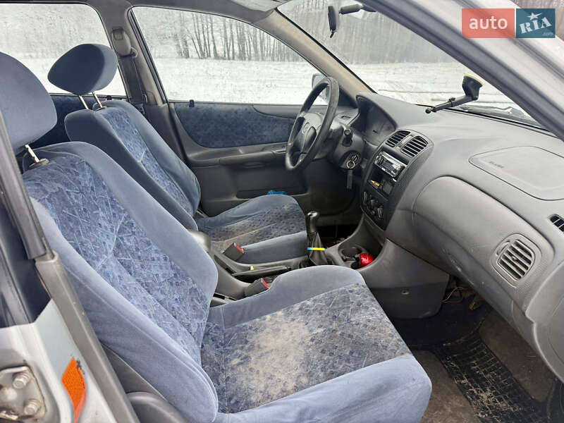 Хэтчбек Mazda 323 1999 в Калиновке фото 17 Хэтчбек Mazda 323 1999 в Калиновке