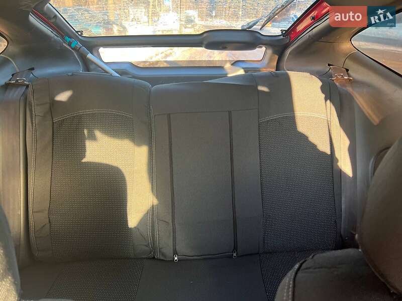 Хетчбек Mazda 323 1995 в Києві фото 15 Хетчбек Mazda 323 1995 в Києві