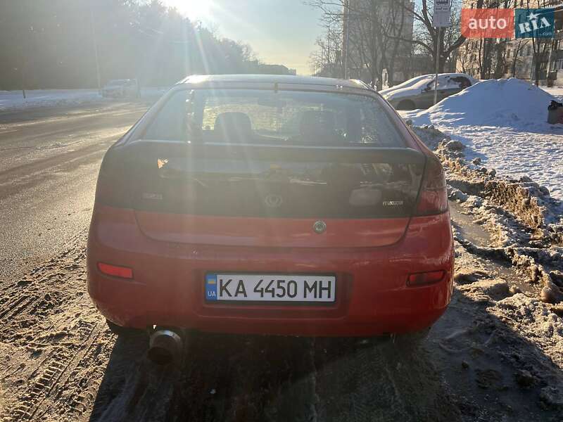 Хетчбек Mazda 323 1995 в Києві фото 4 Хетчбек Mazda 323 1995 в Києві