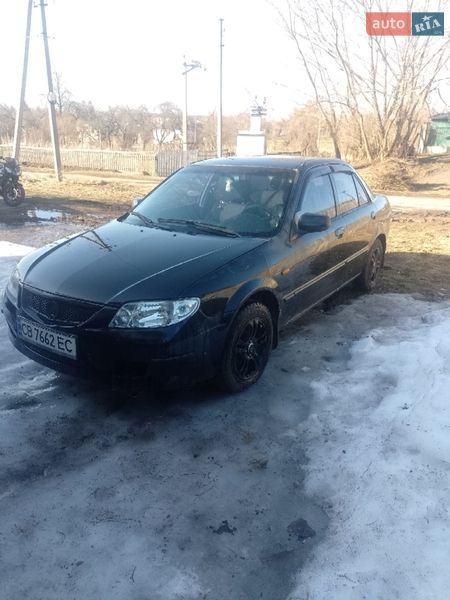 Седан Mazda 323 2002 в Ріпках