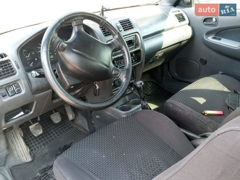 Хэтчбек Mazda 323 1997 в Буске фото 15 Хэтчбек Mazda 323 1997 в Буске