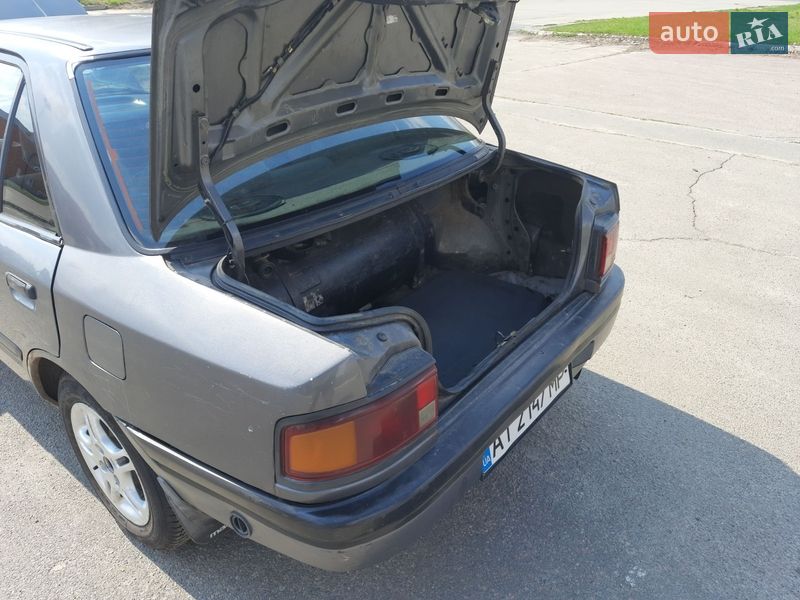 Седан Mazda 323 1991 в Києві фото 10 Седан Mazda 323 1991 в Києві