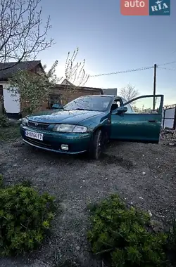 AUTO.RIA – Продам Мазда 323 1998 (AH0764IT) бензин 1.5 седан бу в