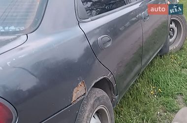 Седан Mazda 323 1997 в Новомосковске