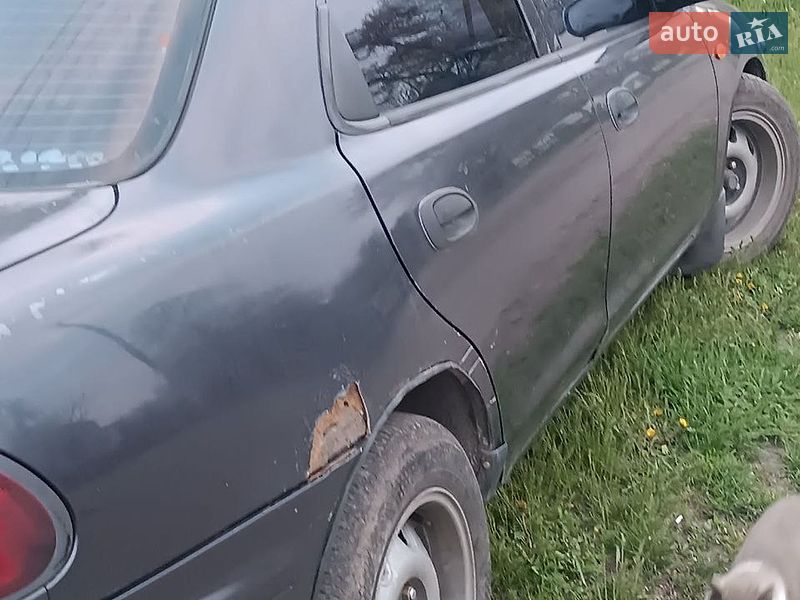 Седан Mazda 323 1997 в Новомосковске