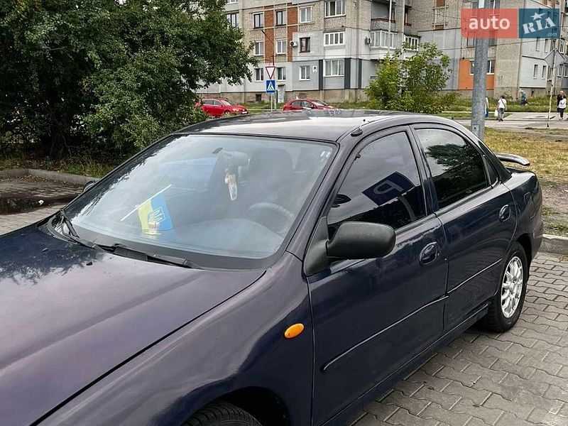 Седан Mazda 323 1997 в Шептицькому фото 10 Седан Mazda 323 1997 в Шептицькому
