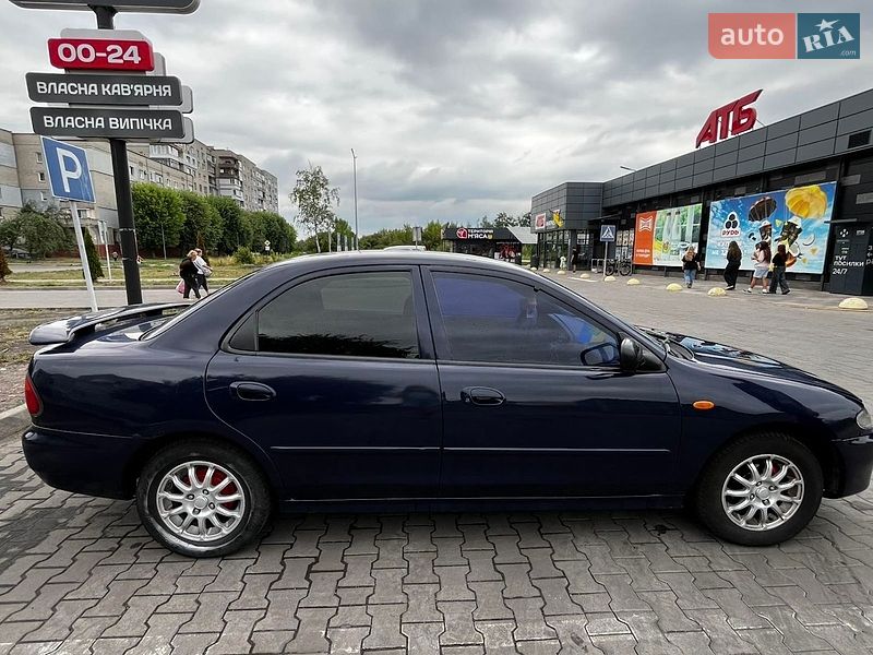 Седан Mazda 323 1997 в Шептицькому фото 12 Седан Mazda 323 1997 в Шептицькому